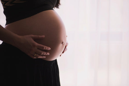 a belly of a pregnant woman