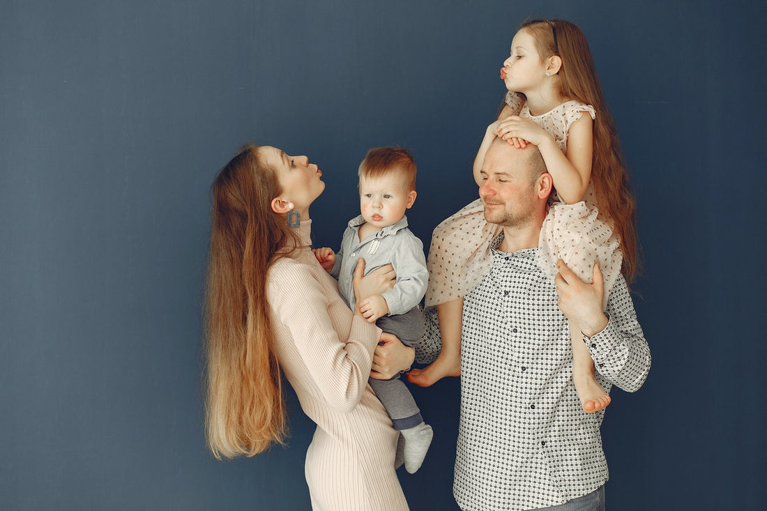 a family wearing matching outfits