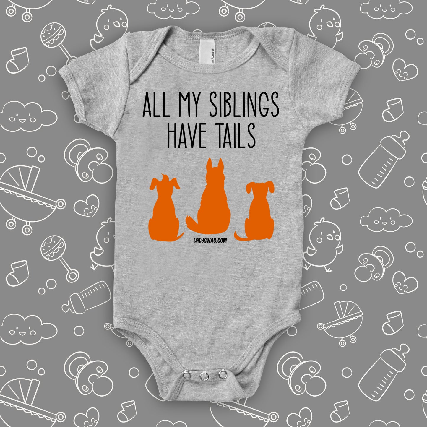 Grey cute baby onesie with "All My Siblings Have Tails" saying and an image of three dogs.