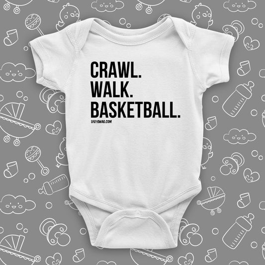 Cute baby boy onesies with saying "Crawl. Walk. Basketball" in white.