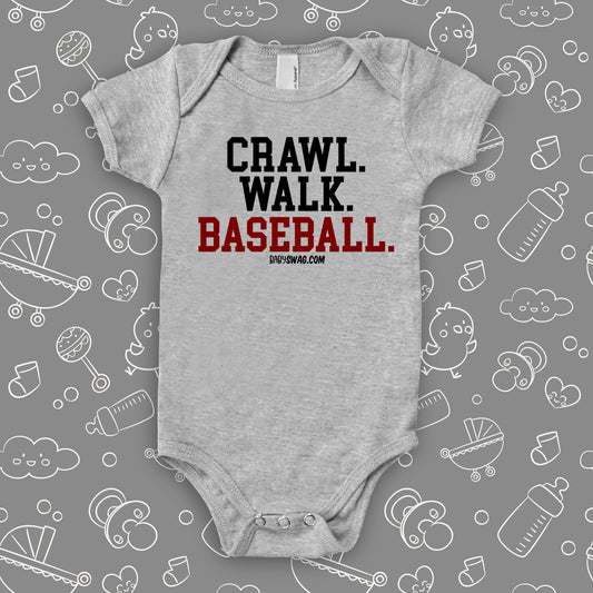 Cute baby boy onesies with the caption "Crawl. Walk. Baseball" in grey.