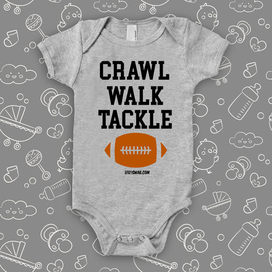 The "Crawl. Walk. Tackle" cute baby onesies in grey.
