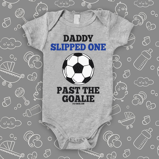 Hilarious baby onesies with saying "Daddy Slipped One Past The Goalie" in grey.