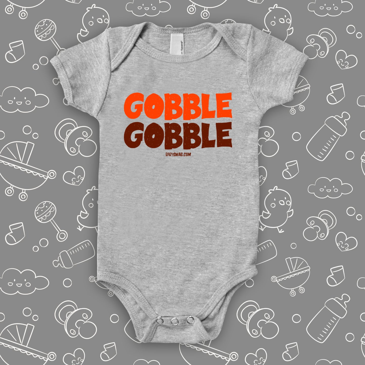 Funny baby onesies with saying "Gobble, gobble" in grey.