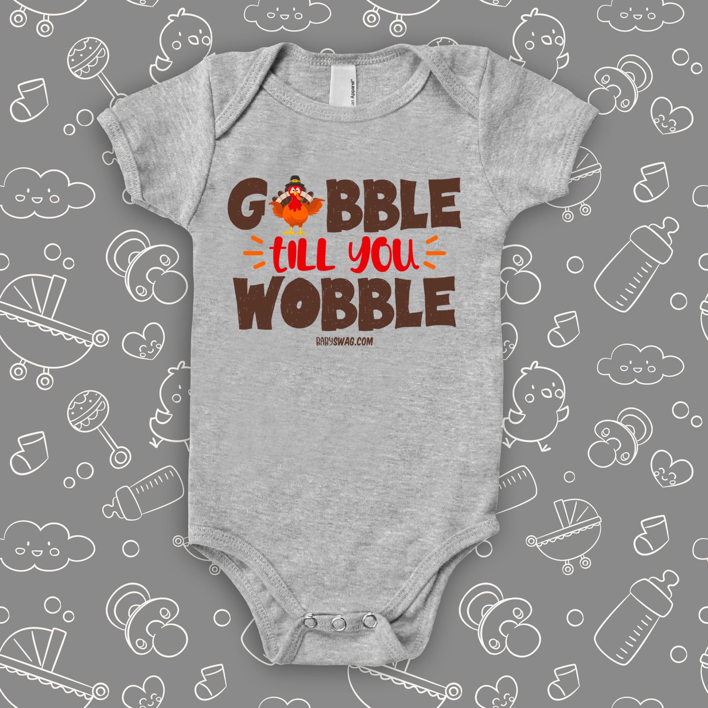 Funny baby onesies with saying "Gobble Till You Wobble" in grey.