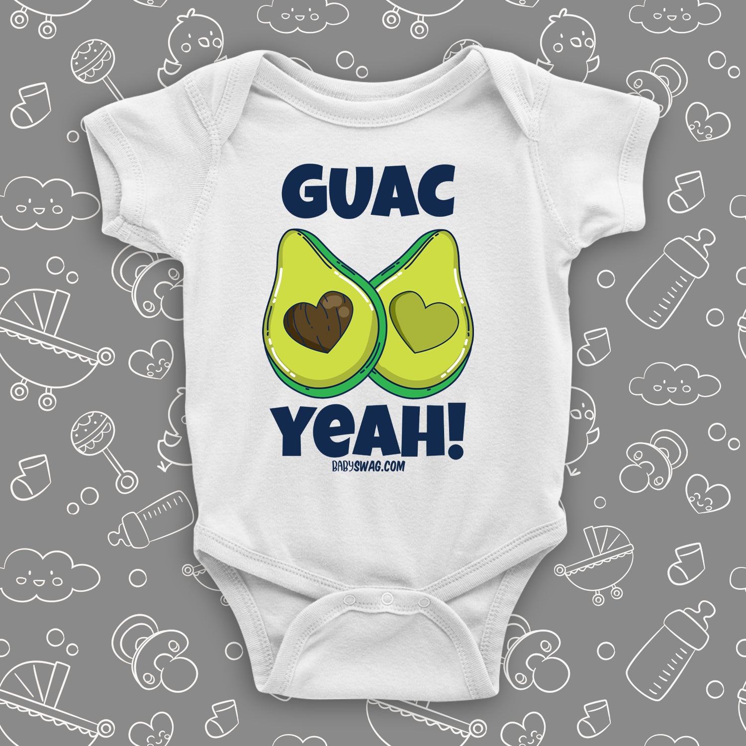 White unique baby onesie with "Guac Yeah!" print and image of avocade with heart-shaped stone.