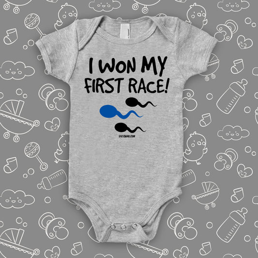 Funny baby onesies with saying "I Won My First Race" in grey.