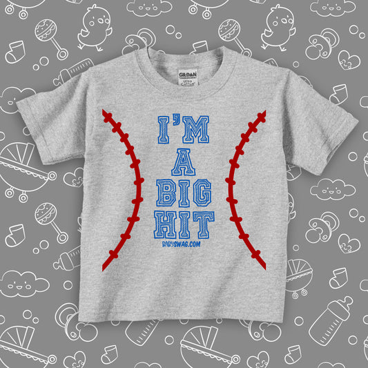 Funny toddler boy shirt with saying "I'm A Big Hit" in grey.