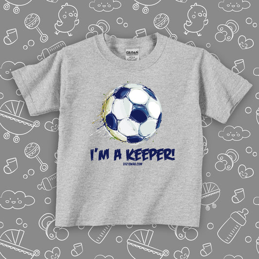 Toddler boy graphic tee with the caption "I'm A Keeper" in grey.