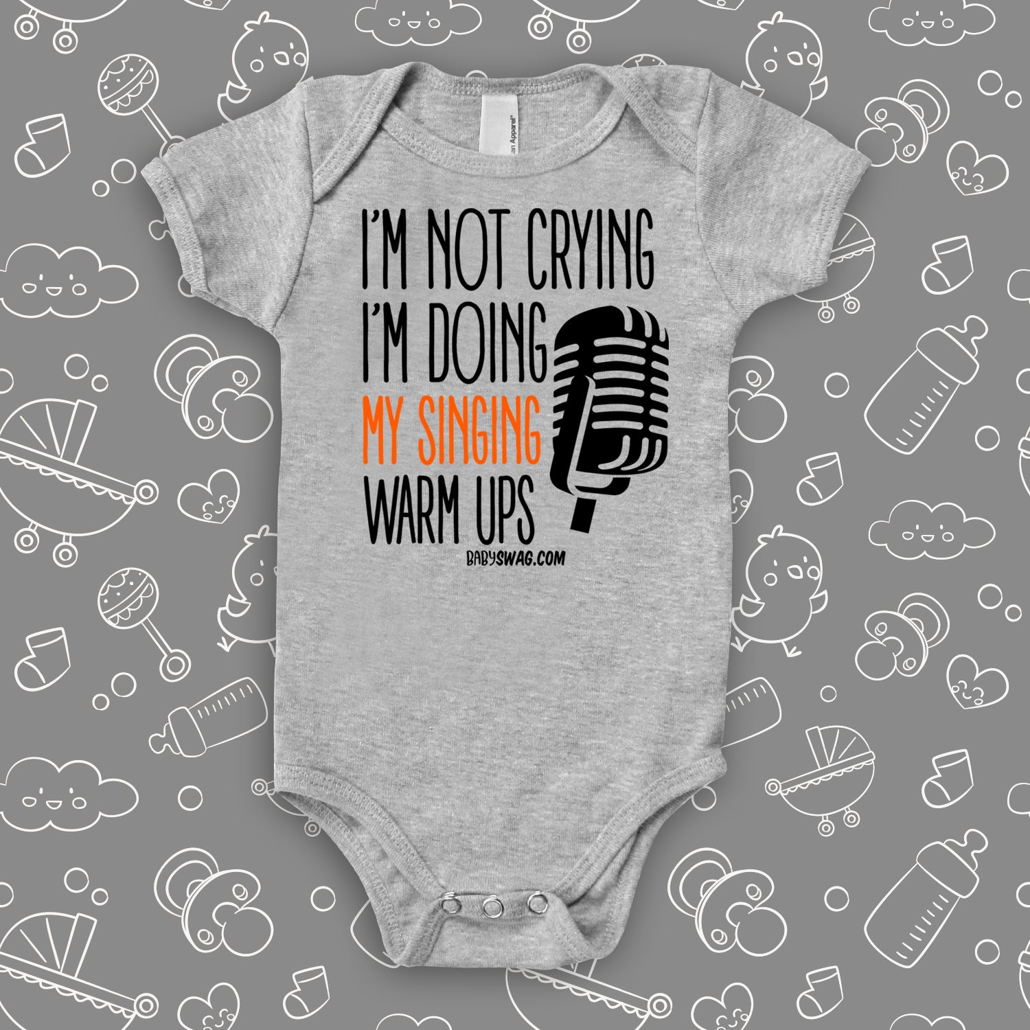 Hilarious baby onesies with saying "I'm Not Crying, I'm Doing My Singing Warm Ups" in grey.