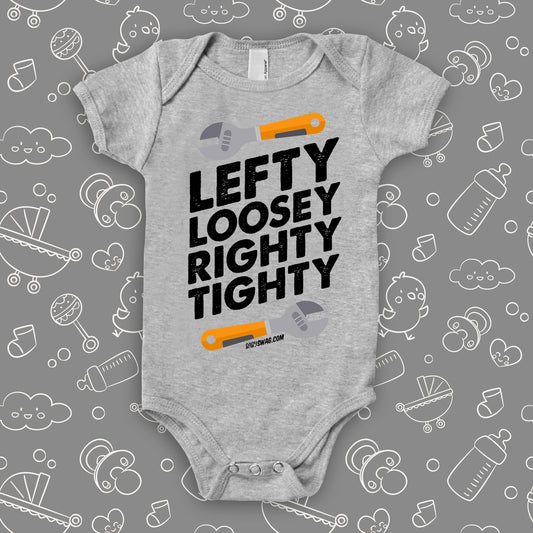 A unique baby boy onesie saying "Lefty Loosey Righty Tighty", in grey.