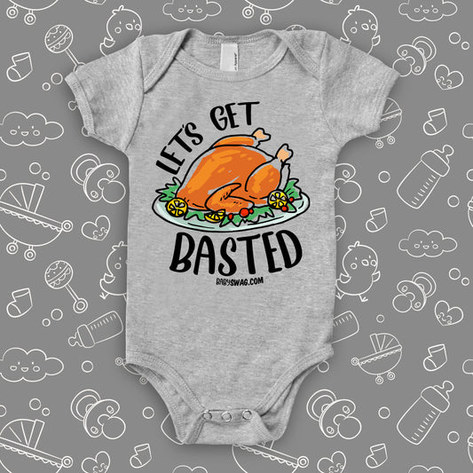 Funny baby onesies with saying "Let's Get Basted" in grey.