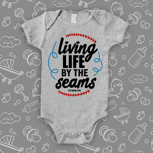 Cool baby onesies with saying "Living Life By The Seams" in grey.