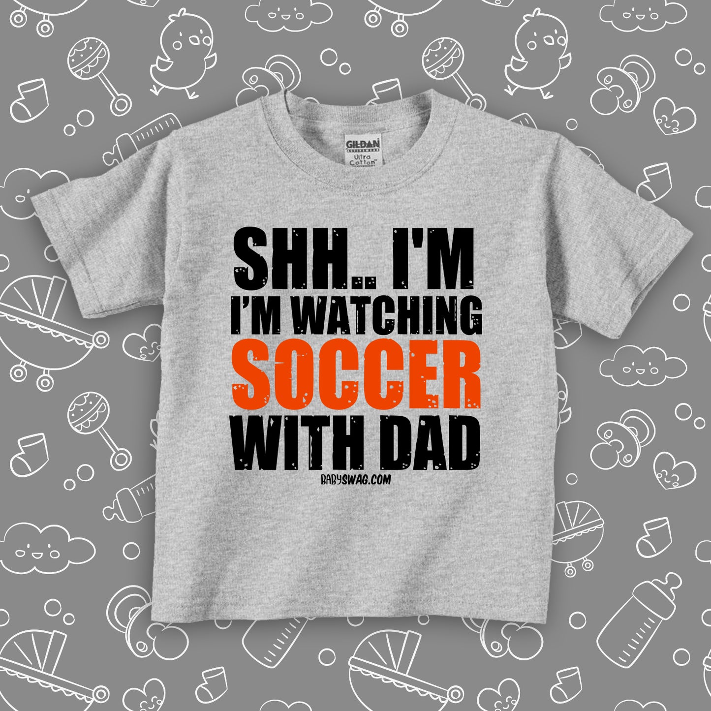 Toddler boy shirts with the caption "Shh..I'm Watching Soccer With Dad" in grey. 