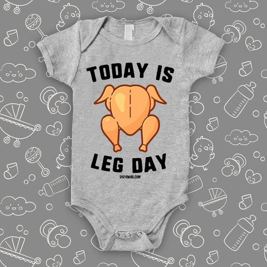 Hilarious baby onesies with saying "Today Is Leg Day" and an image of roasted turkey in grey.