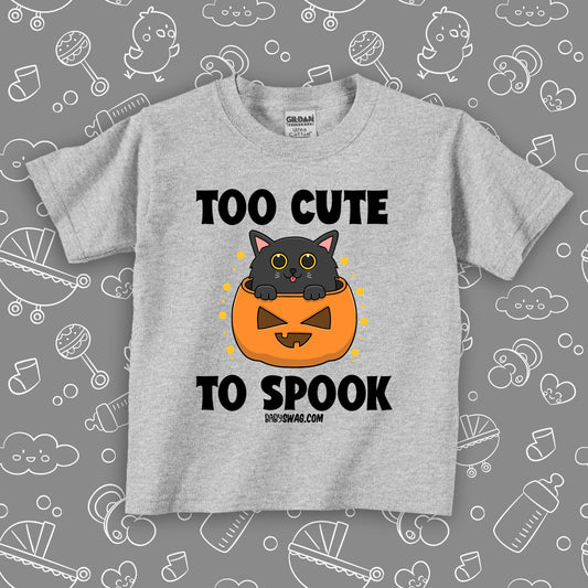 Toddler graphic tees with saying "Too Cute To Spook" in grey.