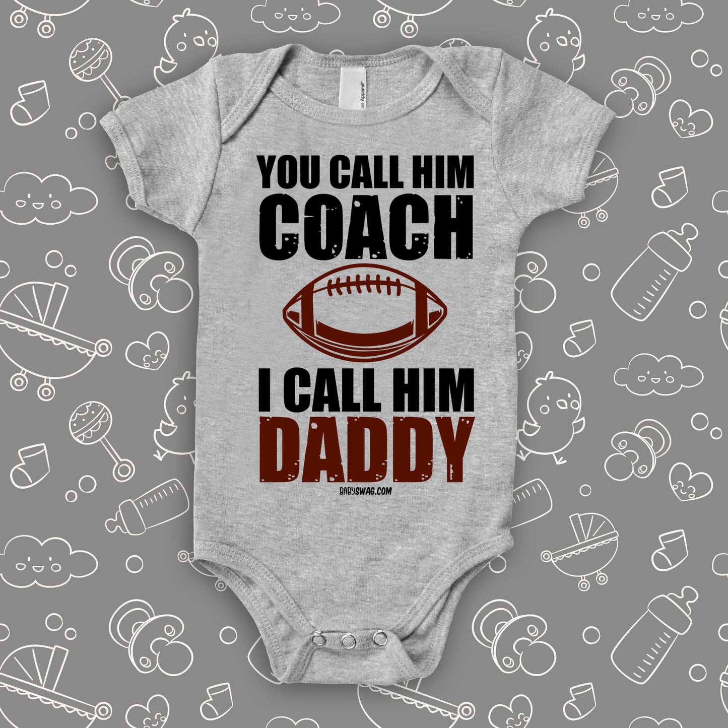Cute baby onesie with saying "You Call Him Coach, I Call Him Daddy" in grey.