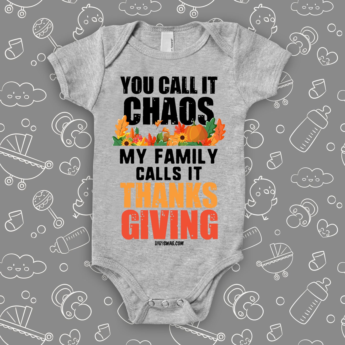 Funny baby onesie with saying "You Call Iy Chaos, My Family Calls It Thanksgiving" in grey.