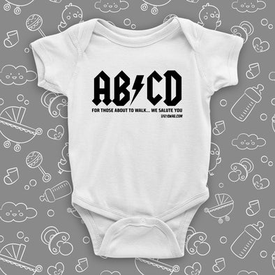 The rock n roll onesies with saying "ABCD" in white.