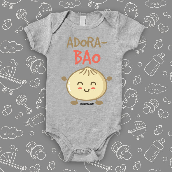  Cute baby onesies with saying "Adora-Bao" in grey. 