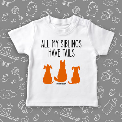Cute toddler graphic tees with saying "All My Siblings Have Tails" and an image of three dogs in white.