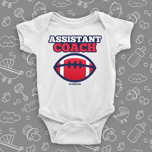 Cool baby boy onesie saying "Assistant coach", in white.