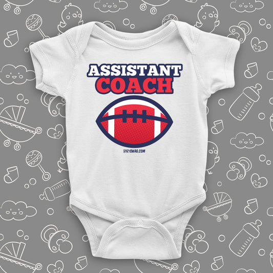 Cool baby boy onesie saying "Assistant coach", in white.