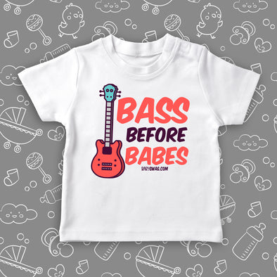 Toddler boy shirt with saying "Bass Before Babes" in white.