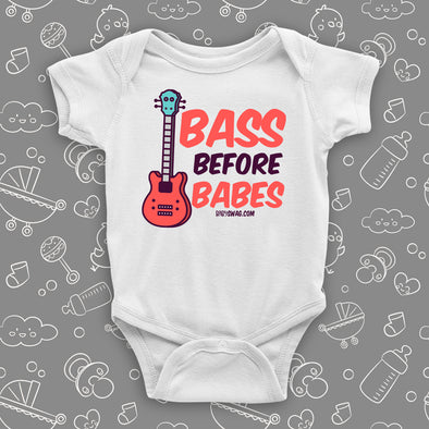 Cute baby boy onesie with saying "Bass Before Babes" in white.