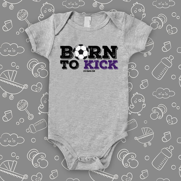 Cute baby boy onesies with sayings "Born To Kick" in grey.