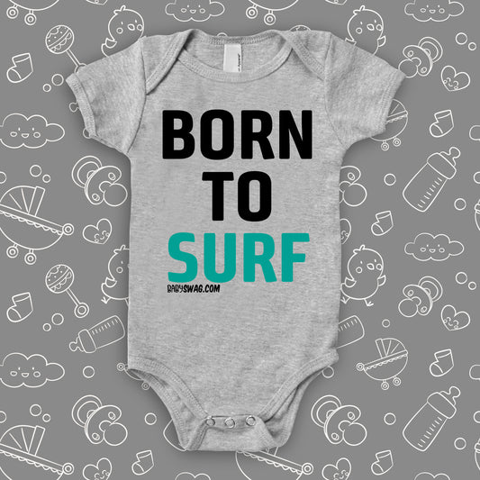 The "Born To Surf" baby onesies in grey.