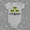 Grey cool baby onesie saying "Cool beans". 