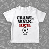 Toddler shirt with saying "Crawl. Walk. Kick" in white.