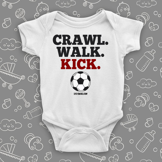 Baby boy onesies with the caption: "Crawl. Walk. Kick" in white.