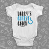 The "Daddy's Cutest Catch" cute baby onesies in white. 
