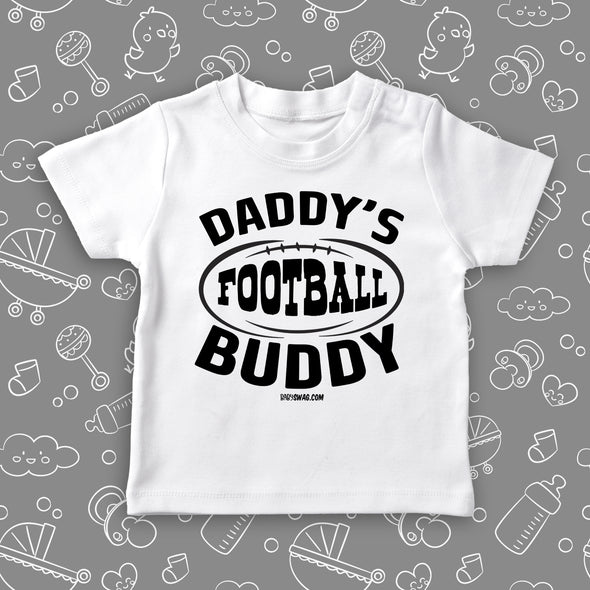 Toddler boy graphic tee with saying "Daddy's Football Buddy" in white. 