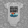  Unique baby boy onesies with saying "Daddy's Future Boating Buddy" in grey. 