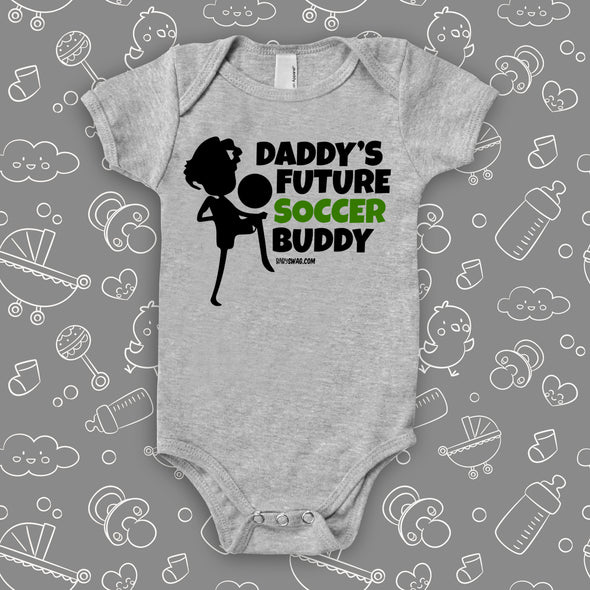 Cute baby boy onesie with the caption "Daddy's Future Soccer Buddy" in grey.