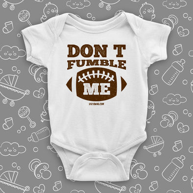 Funny baby onesies with saying "Don't Fumble" in white.