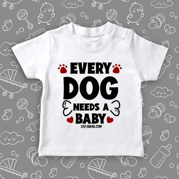 Toddler graphic tees with saying "Every Dog Need A Baby" in white.