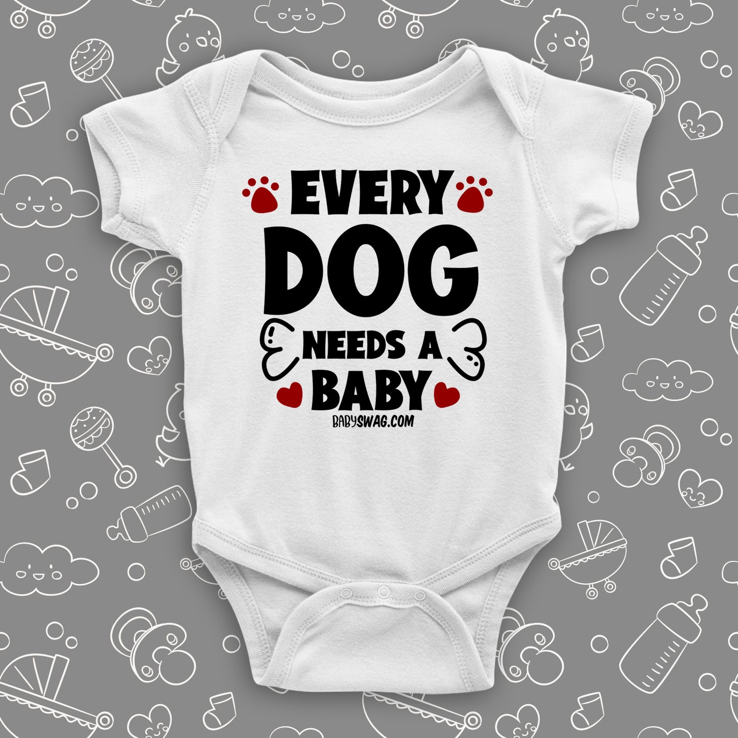 White cute baby onesie saying "Every dog needs a baby", red paws and bone also printed.
