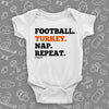 Cool baby onesies with saying "Football. Turkey. Nap. Repeat" in white.