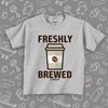 Cool toddler shirt with "Freshly brewed" print and an image of a coffee cup, color grey. 