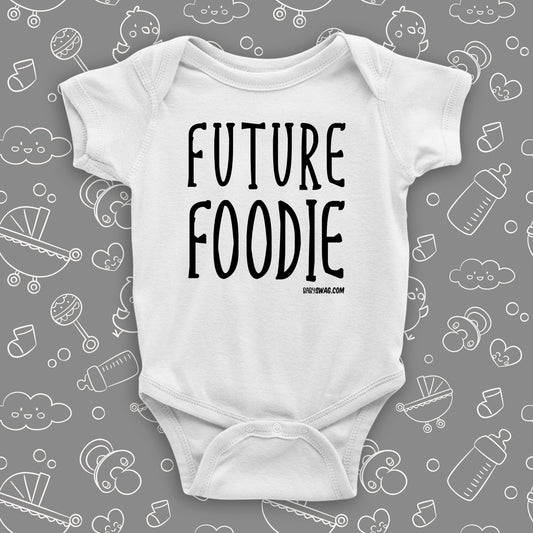 Unique baby onesie with saying "Future Foodie" in white.