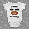 Cute baby boy onesies with saying "Get My Bottle I'm Watching Football With Daddy" in white. 