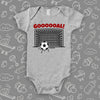 Graphic baby onesies with an image of goal and soccer ball and the caption "Goooooal!" in grey.