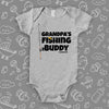 Cute baby onesies with a saying "Grandpa's Fishing Buddy" in grey. 