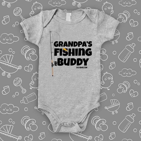 Cute baby onesies with a saying "Grandpa's Fishing Buddy" in grey. 