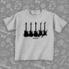The "Guitars" toddler graphic tees with a print of four guitars in grey. 