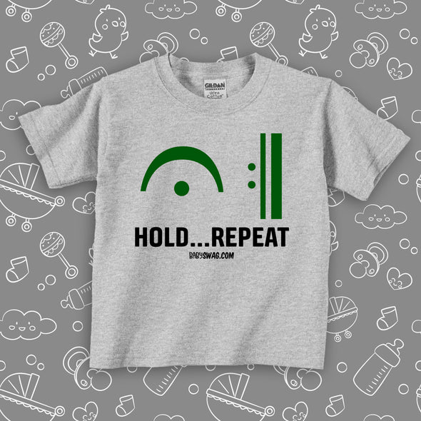 The "Hold Repeat" cute toddler shirt in grey. 